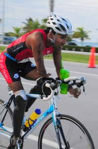 rajeshdurbalonbike 199x300 The Quiet Power of Humility   The Worlds First Triple Amputee Finishes Ironman